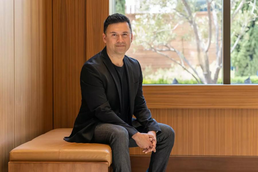 Edgar Miramontes, CAP UCLA's new Executive and Artistic Director smiles and poses for photo